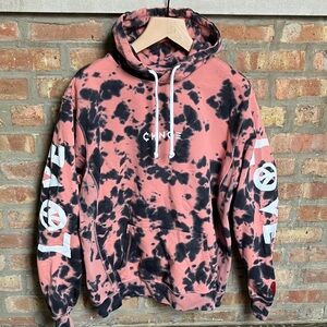 CHNGE "Allow Yourself To Grow" hoodie in a pink and black tie-dye pattern.